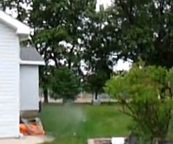Sprinkler in neighbor's yard