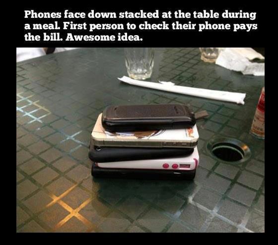 B. cell phone on table