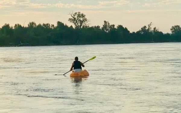 Nebraska man sets new Guinness World Record for paddling pumpkin down river
