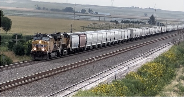 Union Pacific grain train — passing by Chappell Nebraska — home of DMC’s back office