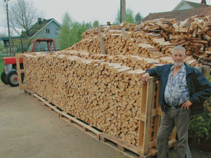 Norwegian Wood man on right side of stack